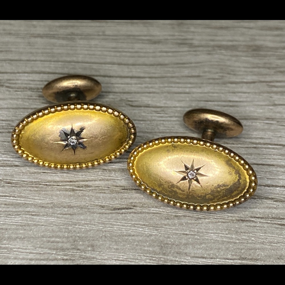 Antique cufflinks with diamond accent